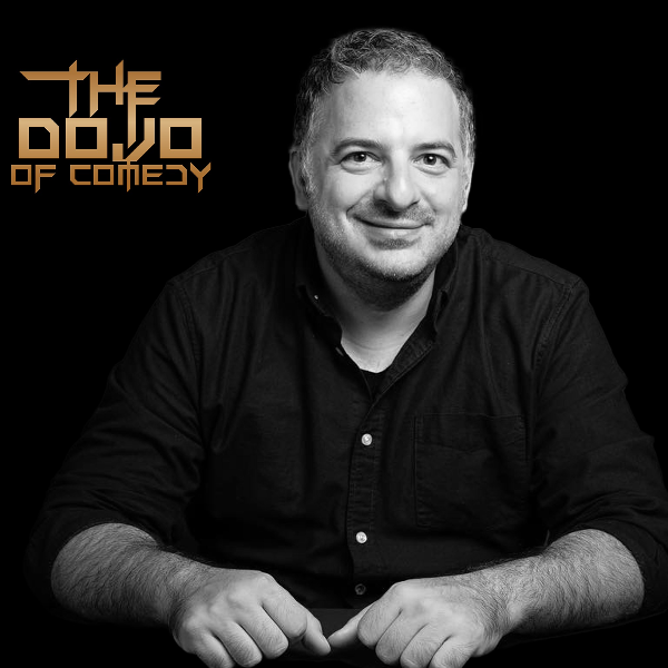 Greg Stone Mic Headshot